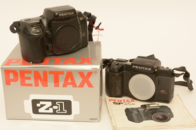 Lot 876 - Two Pentax cameras.
