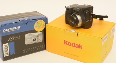 Lot 877 - An Olympus digital camera; and a Kodak digital camera.
