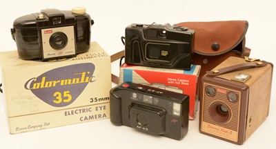 Lot 883 - Four cameras.