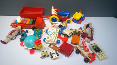 Lot 1133 - Box of Vintage plastic toys and dolls c1970's by Tri-ang, Tonka, Fisher-Price, and others.