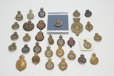 Lot 1017 - A collection of regimental cap badges
