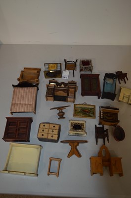 Lot 1144 - Vintage wooden, metal, and other doll's house furniture and furnishings.