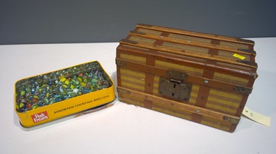 Lot 1145 - A Vintage dolls trunk and a box of vintage glass marbles.