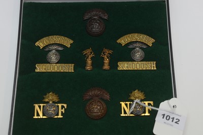 Lot 1012 - A collection of regimental cap badges