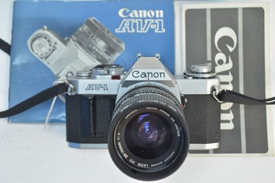 Lot 848 - A Canon AV-1 camera and lens.