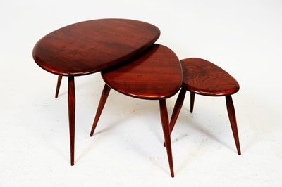 Lot 82 - Ercol - Nest of three 'Pebble' tables