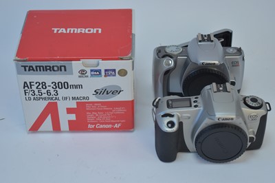 Lot 840 - Two Canon cameras and a lens.
