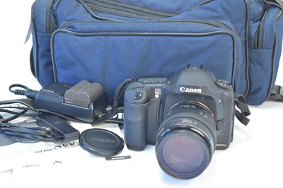 Lot 841 - A Canon digital camera and lens.
