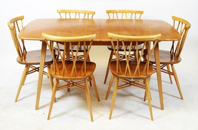 Lot 90 - Ercol - Grand Windsor extending dining table and six Ercol Shalstone dining chairs