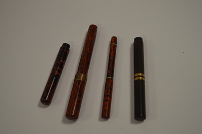 Lot 689 - Three The Unique Pen fountain pens and another