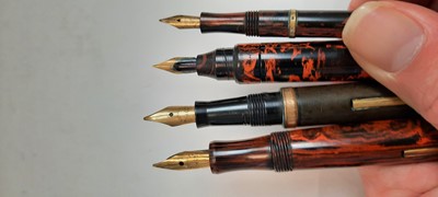 Lot 689 - Three The Unique Pen fountain pens and another