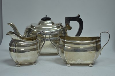 Lot 16 - Three piece silver tea service and brassware