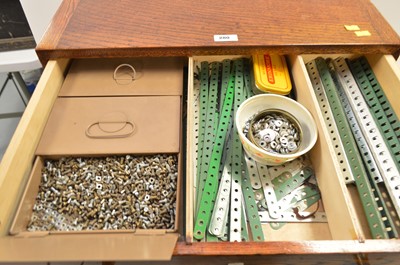 Lot 280 - Meccano in an oak chest of drawers