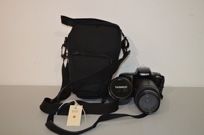 Lot 950 - Nikon F50 SLR camera; and a Tamron AF lens.