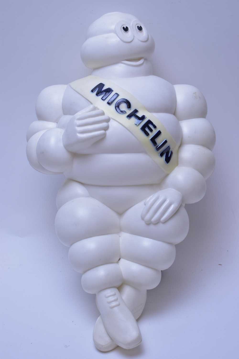 Lot 154 - A plastic vintage Michelin Man figure on stand.