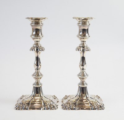 Lot 99 - A pair of Georgian style candlesticks