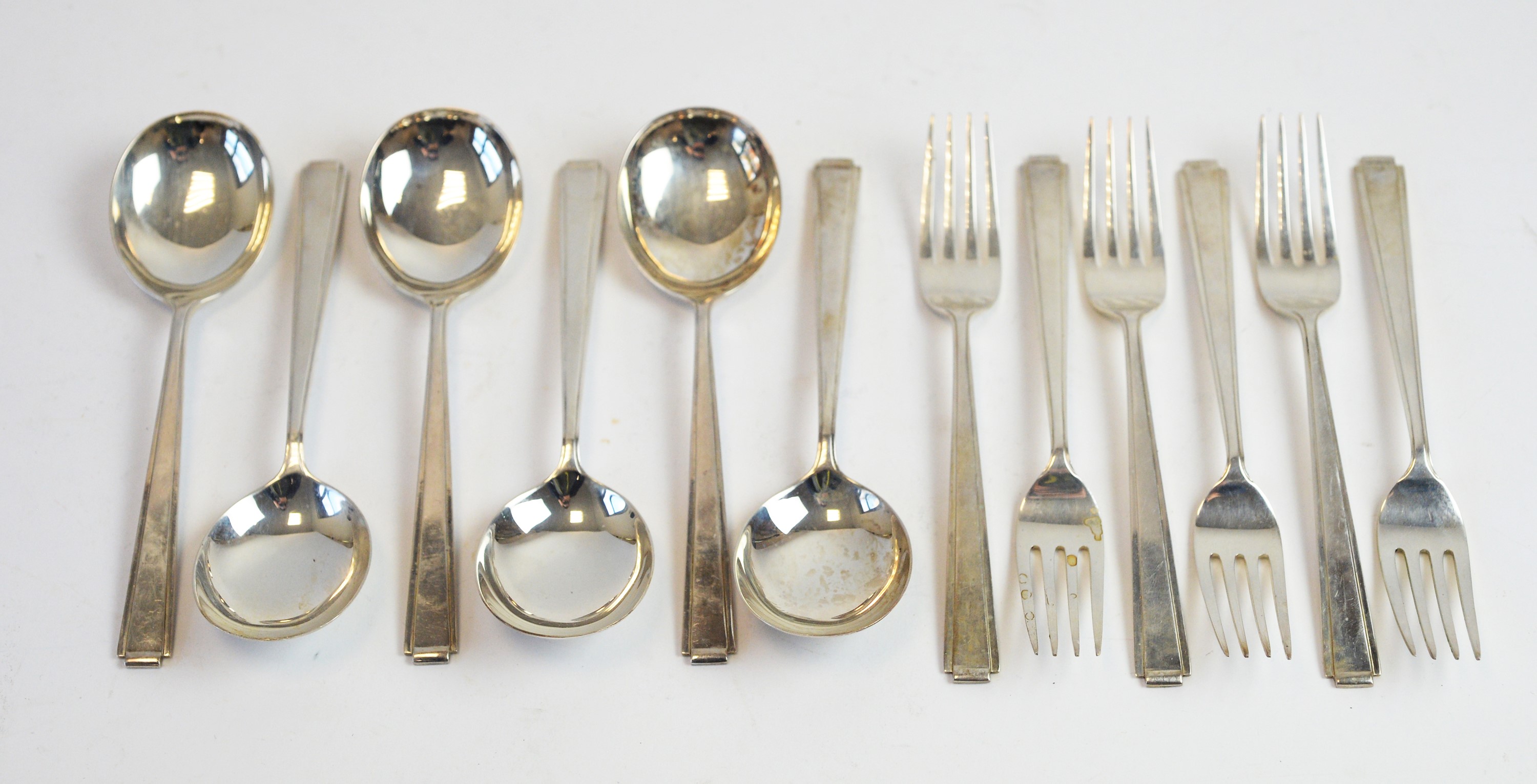 Lot 101 Set of six silver spoons and forks
