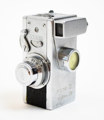 Lot 639 - A Steky Model III 16mm camera; and Stekinar Anastigmat 25mm lens.