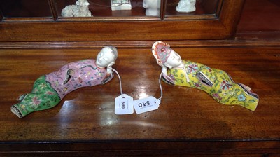 Lot 590 - Pair of Chinese wall hanging figures