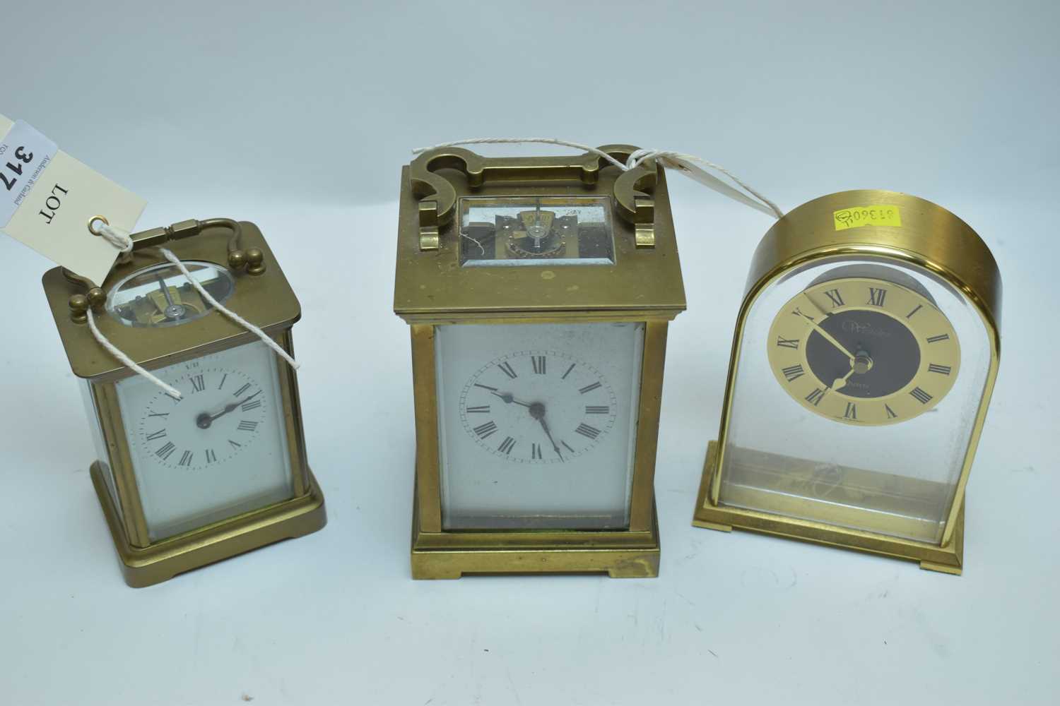 Lot 317 - Two French carriage clocks; and a Westclox mantel clock.