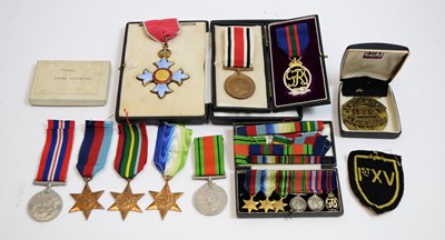 Lot 730 - A collection of medals, badges and ribbon bars.