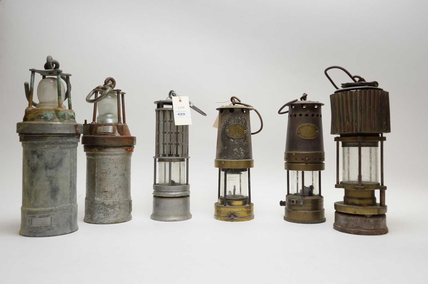 Lot 429 - Six vintage miners lamps