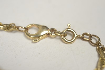 Lot 44 - A 9ct. yellow gold chain necklace.