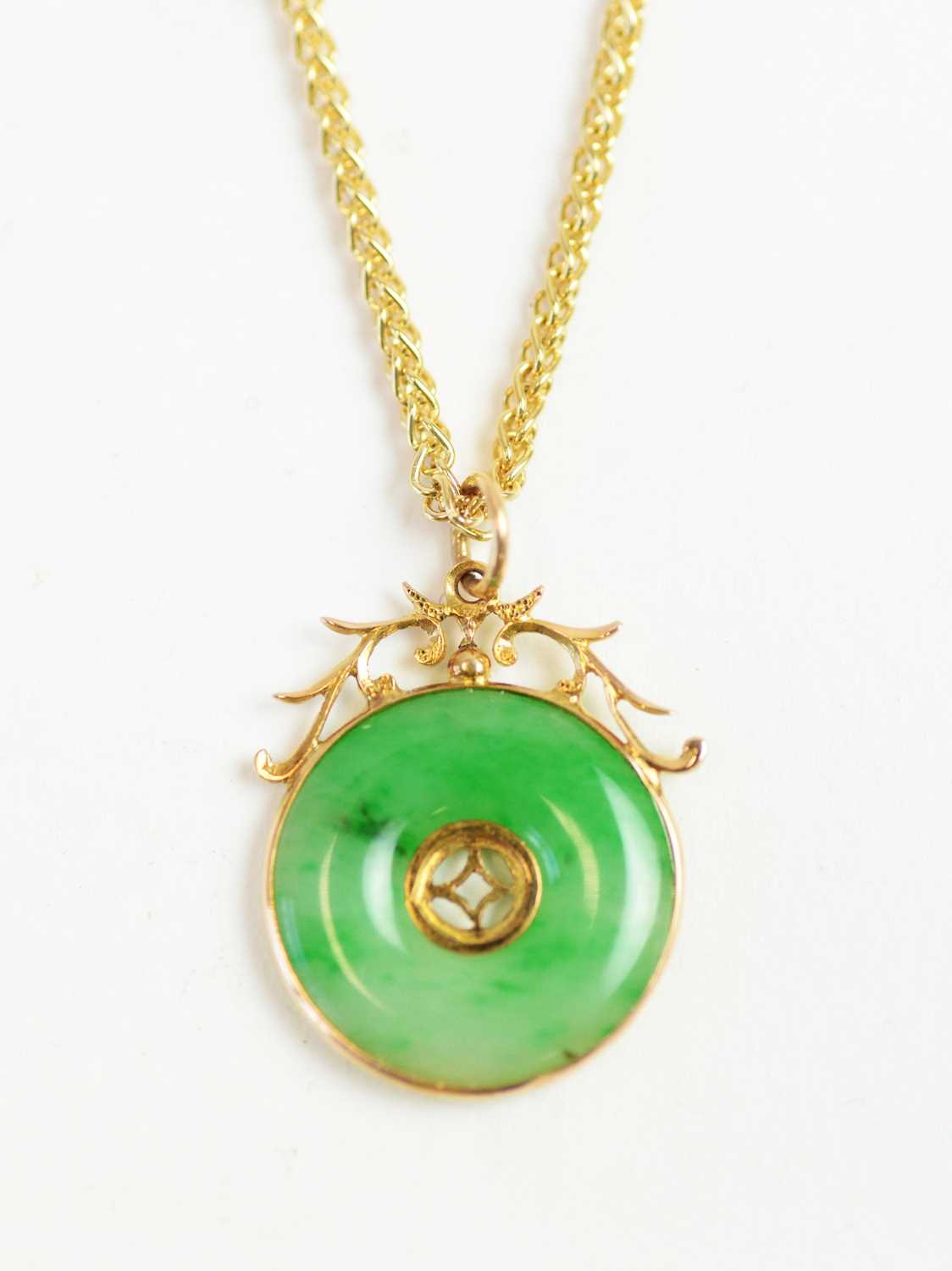Lot 52 - A Chinese jade pendant