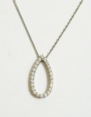 Lot 57 - A diamond pendant on chain