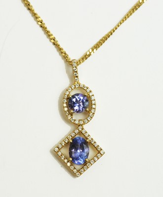 Lot 59 - A tanzanite and diamond drop pendant