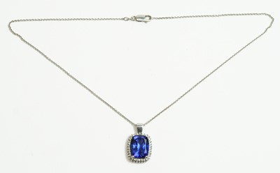 Lot 61 - Tanzanite and diamond cluster pendant
