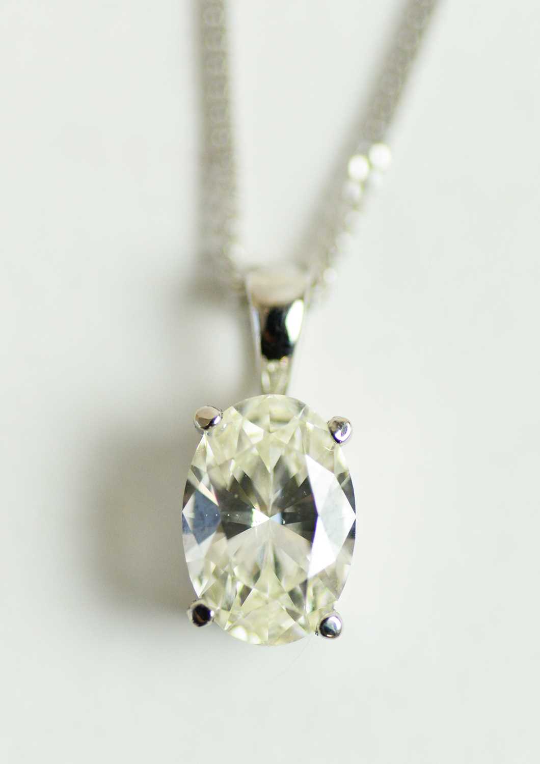 Lot 62 - A single stone diamond pendant