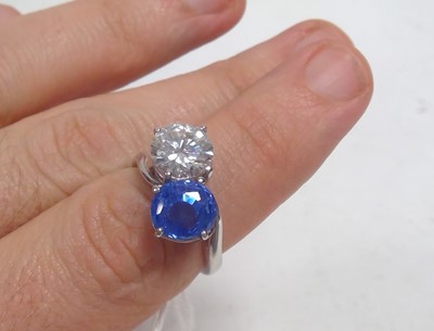 Lot 67 - Sapphire and diamond crossover ring