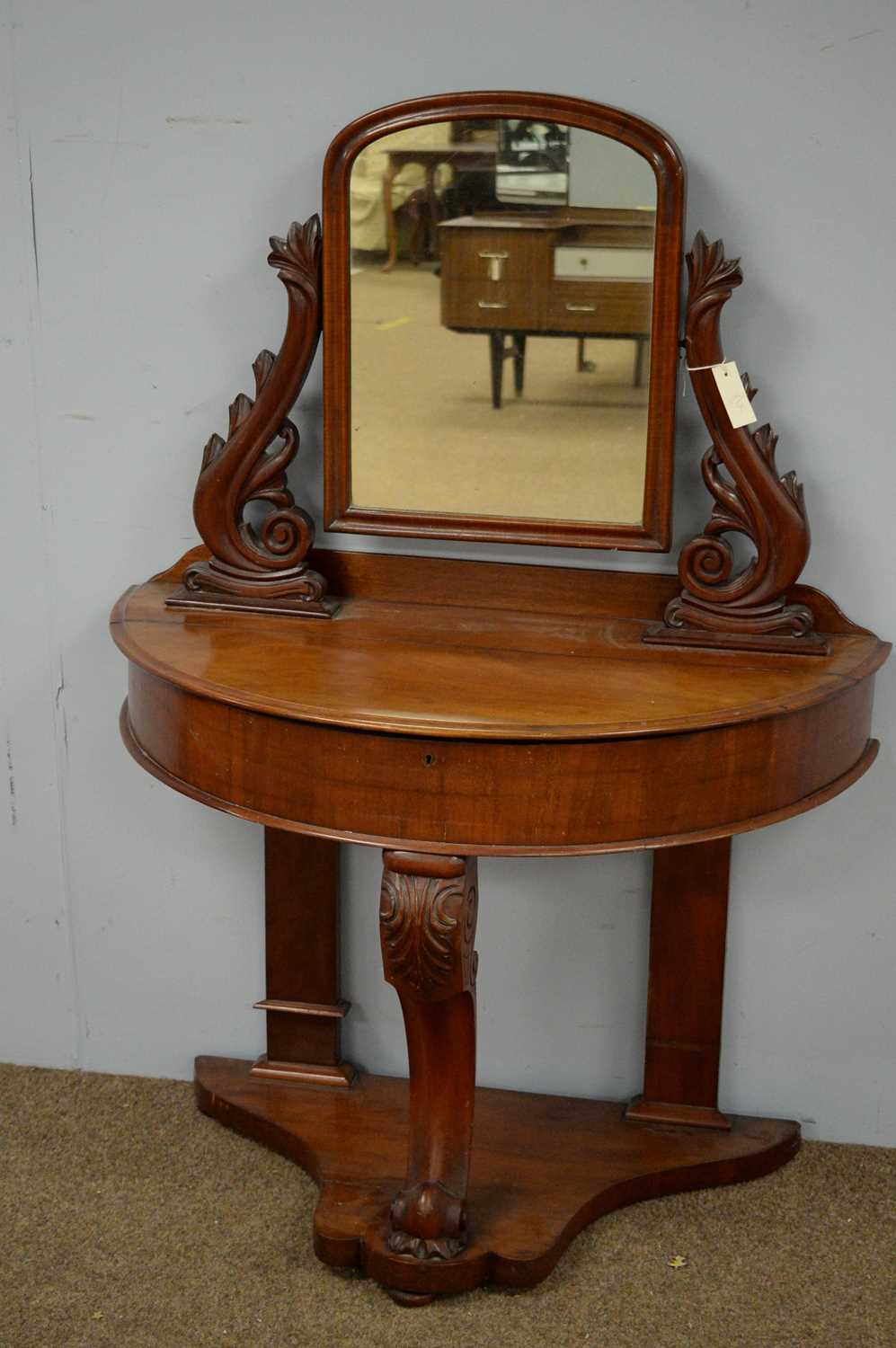 Lot 21 - Victorian mahogany semi-circular Duchess style dressing table.