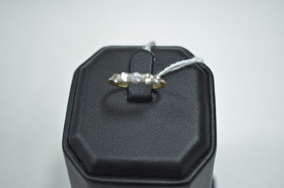 Lot 68 - A five stone diamond ring