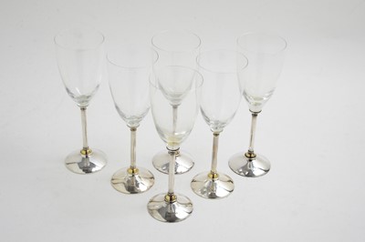 Lot 114 - A set of six champagne glasses with silver stems
