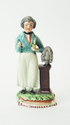 Lot 624 - Staffordshire figure wigmaker