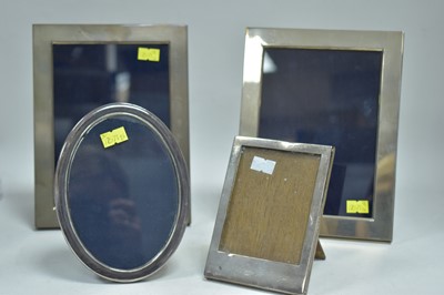 Lot 35 - Four silver framed picture frames