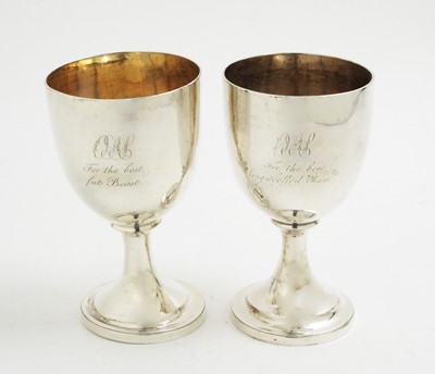 Lot 140 - A pair of George III silver goblets