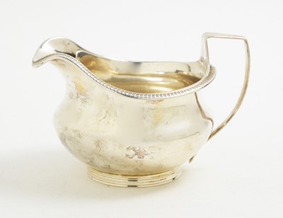 Lot 141 - A George III silver jug, by Solomon Hougham