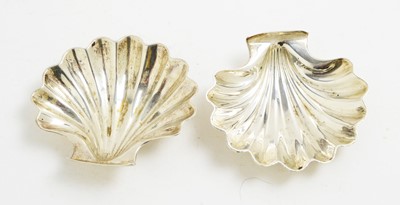 Lot 148 - Two Victorian silver shell pattern butter dishes