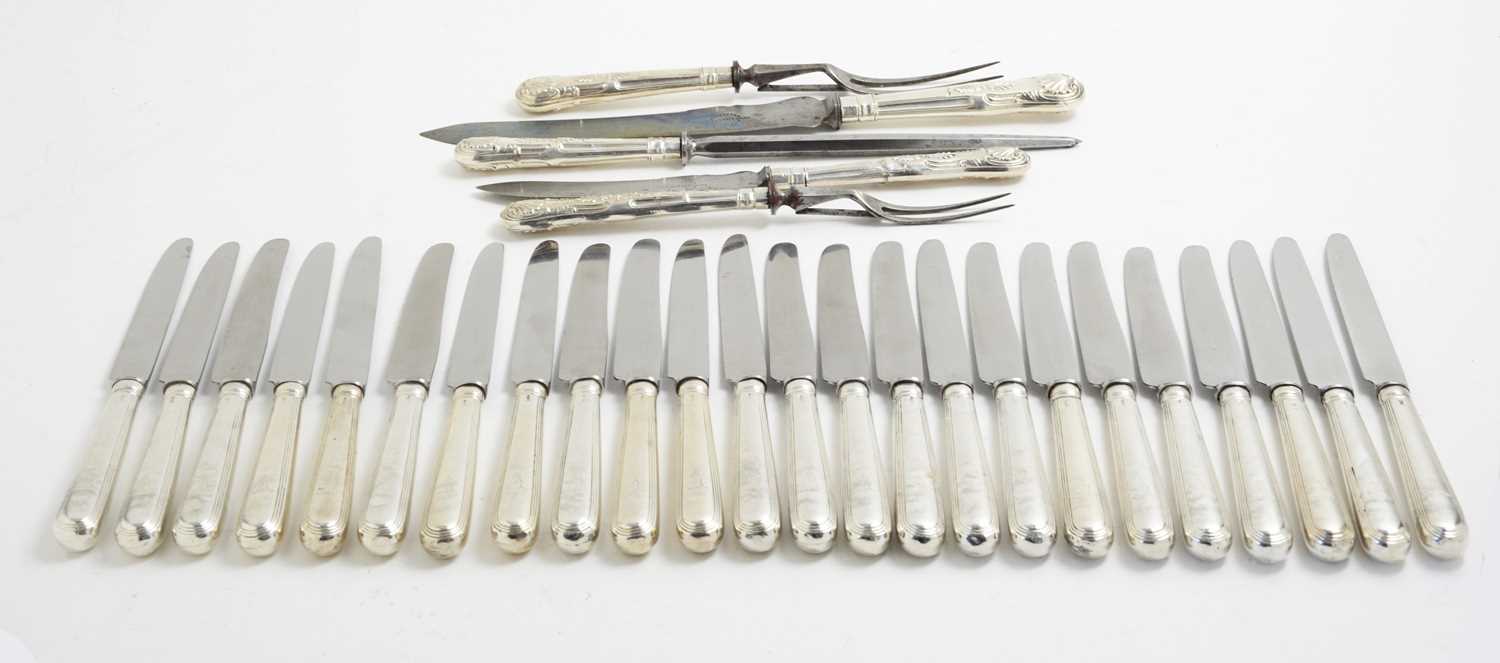 Lot 149 - Twenty-four table knives and a carving set