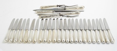 Lot 149 - Twenty-four table knives and a carving set