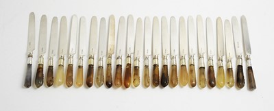 Lot 150 - Twenty-four silver bladed knives with agate handles