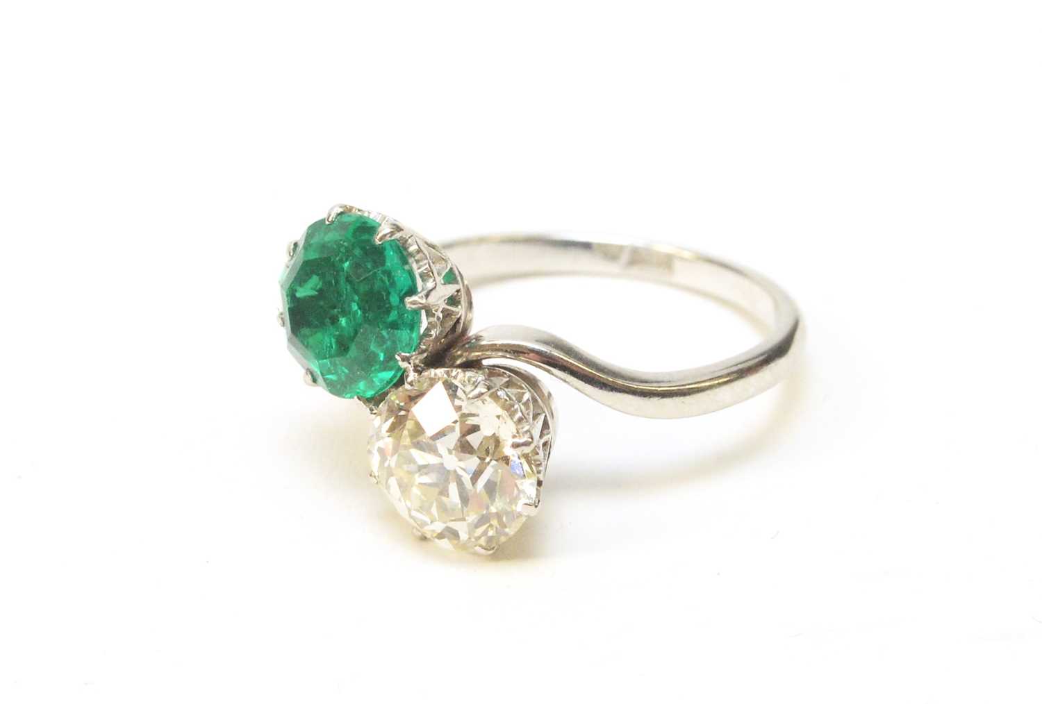 8 - A Colombian emerald and diamond ring