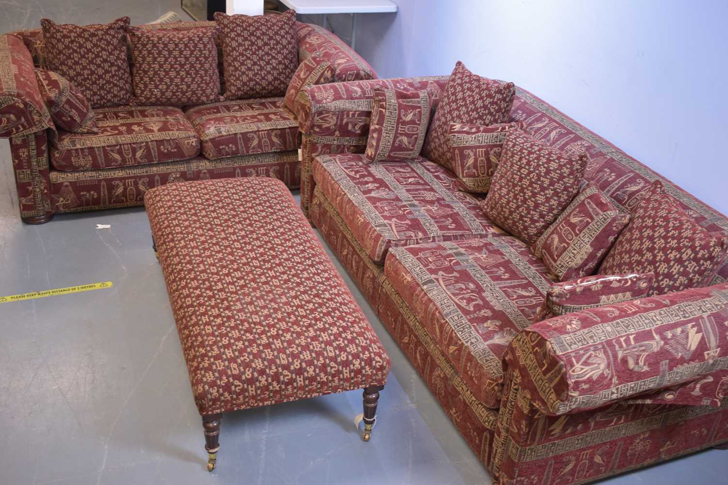 Lot 538 - Two modern sofas and a footstool