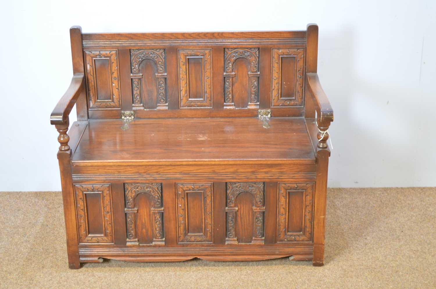 Lot 476 - Old Charm oak hall seat in 17th C style.