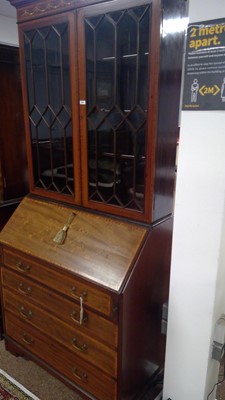 Lot 424 - An Edwardian style secretaire bookcase