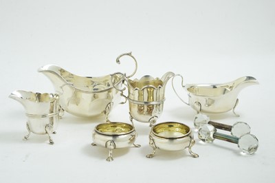 Lot 121 - SilvergGravy boat, sauceboat, 2  cream jugs, pair silver salts, and a  pair of knife rests