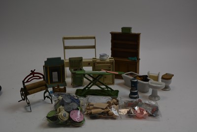 Lot 911 - A collection of vintage and antique miniature dolls, furniture and other items.